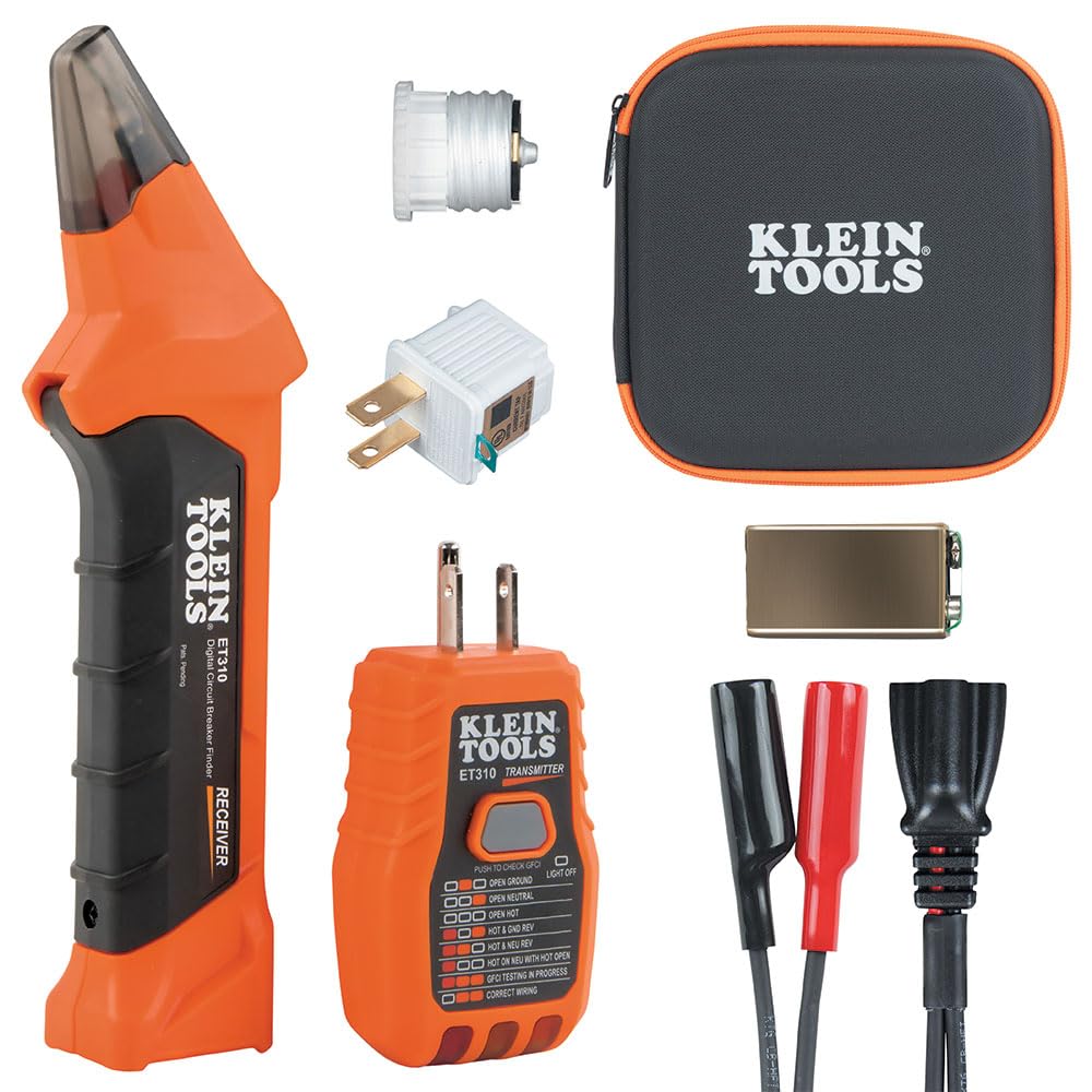 The receiver, transmitter, three adapters, a nine-volt battery and the zipped case laid out together