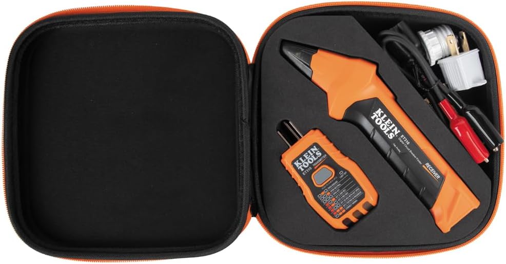The receiver and transmitter with the light socket and grounding adapters beside them